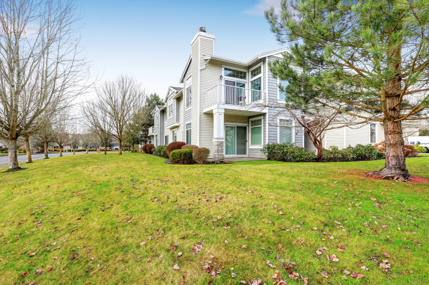 Two story townhome exterior with wood siding. Northwest, USA<br />